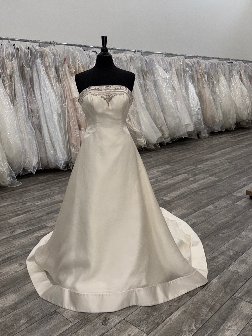 Mon Cheri Strapless Ivory Satin A-Line Wedding Gown with Beaded Accent